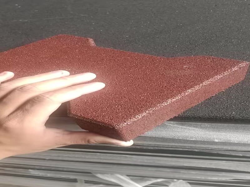 contractor leveling the stall base